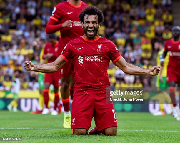 Mohamed Salah of Liverpool celebrates after scoring the third goal during the Premier League match between Norwich City and Liverpool at Carrow Road...