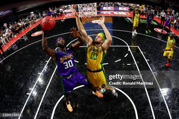 Reggie Evans of the 3 Headed Monsters attempts a shot while being guarded by Spencer Hawes of the Ball Hogs during BIG3 - Week Seven at the Orleans...