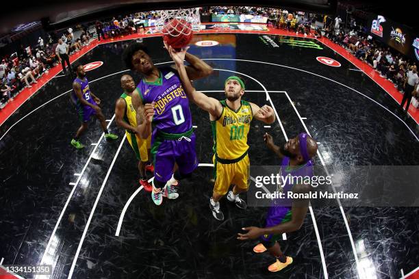 New Williams of the 3 Headed Monsters and Spencer Hawes of the Ball Hogs battle for a loose ball during BIG3 - Week Seven at the Orleans Arena on...