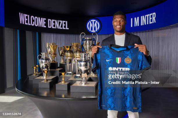 Denzel Dumfries of FC Internazionale poses at FC Internazionale headquarters on August 13, 2021 in Milan, Italy.