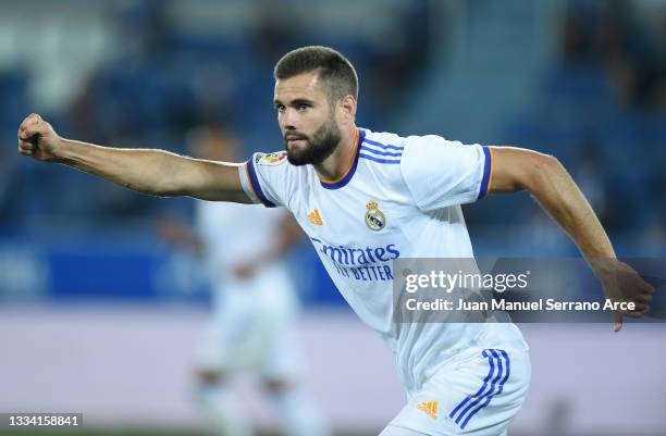 Nacho Fernandez of Real Madrid celebrates after scoring their team's second goal during the LaLiga Santader match between Deportivo Alaves and Real...