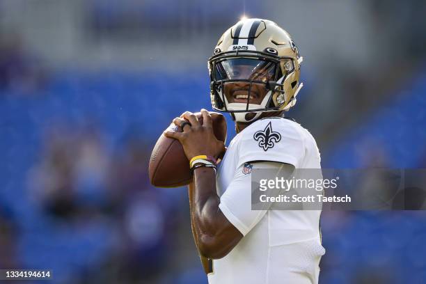 Jameis Winston of the New Orleans Saints throws before the preseason game against the Baltimore Ravens at M&T Bank Stadium on August 14, 2021 in...