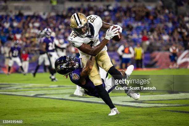 Lil'Jordan Humphrey of the New Orleans Saints scores touchdown against Anthony Averett of the Baltimore Ravens during second quarer of a preseason...