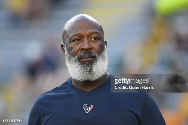 Lovie Smith of the Houston Texans looks on before the preseason game against the Green Bay Packers at Lambeau Field on August 14, 2021 in Green Bay,...