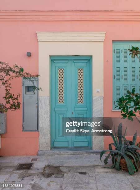 blue door - plaka stock pictures, royalty-free photos & images