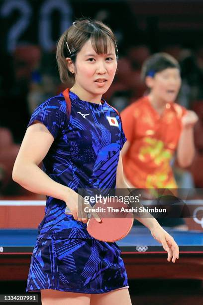 Miu Hirano of Team Japan reacts during the singles match against Wang Manyu of Team China in the Women's Team final on day thirteen of the Tokyo 2020...