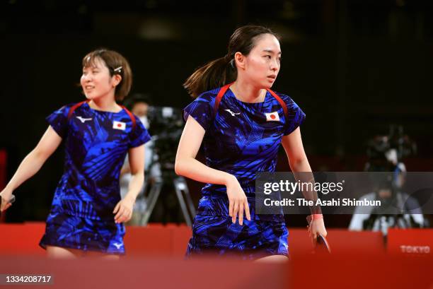 Kasumi Ishikawa and Miu Hirano of Team Japan react in the doubles match against Chen Meng and Wang Manyu of Team China in the Women's Team final on...