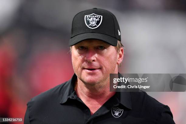 Head coach Jon Gruden of the Las Vegas Raiders exits the field during a preseason game against the Seattle Seahawks at Allegiant Stadium on August...