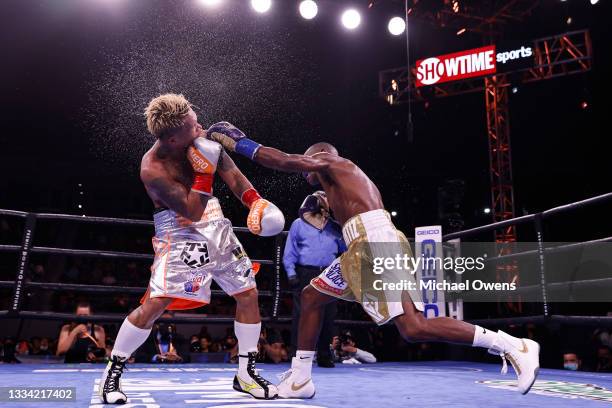 Guillermo Rigondeaux fights John Riel Casimero during their WBO Bantamweight title 12 round bout at Dignity Health Sports Park on August 14, 2021 in...