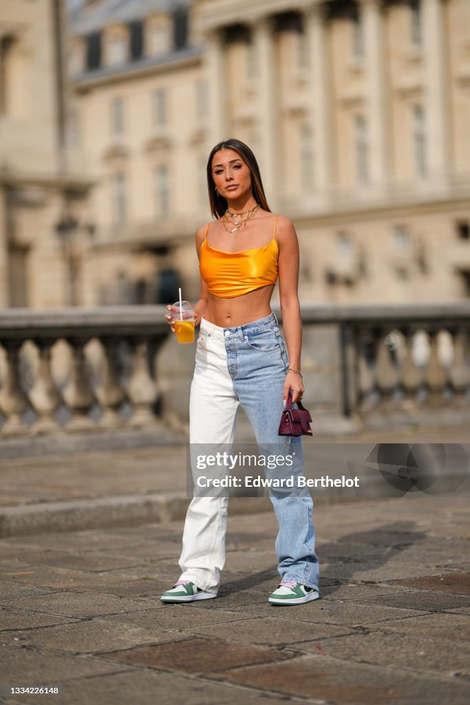 Isabeau Delatour isabeau.delatour wears large gold chain pendants