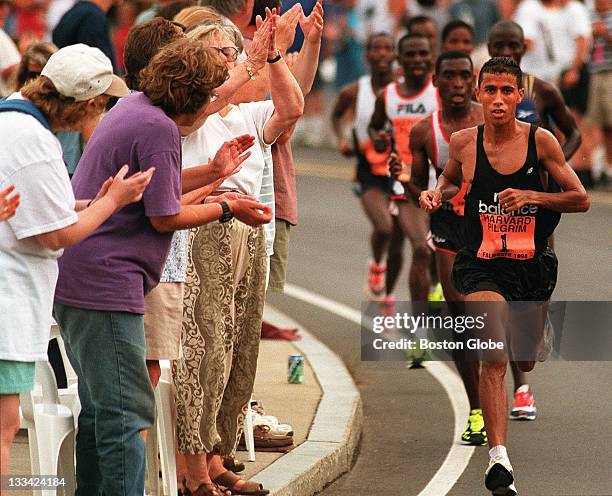 Khalid Khannouchi of Morocco moves to the head of the pack towards the end of the Falmouth Road Race. He went on to win the race.