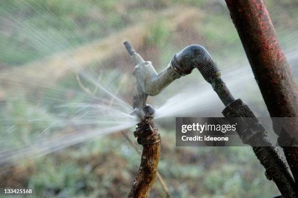 pressure gushing - water wastage stock pictures, royalty-free photos & images