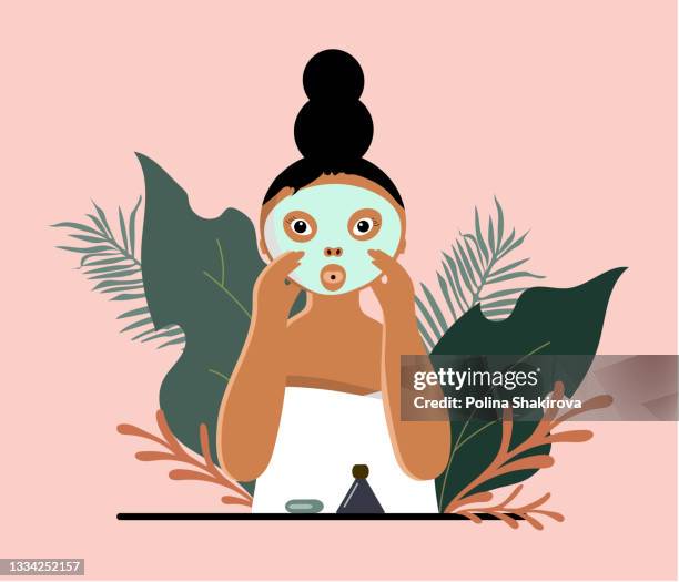 woman in towel with eco face mask on her face. - woman applying cotton ball stock illustrations