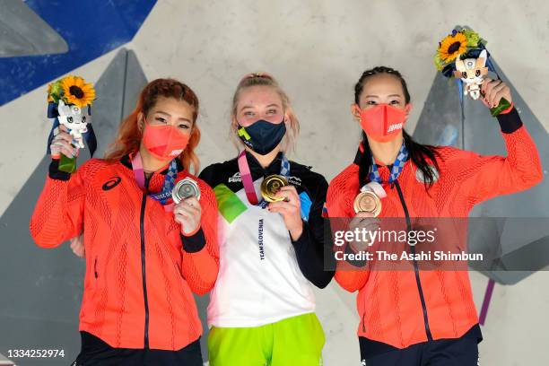 Silver medalist Miho Nonaka of Team Japan, gold medalist Janja Garnbret of Team Slovenia and bronze medalist Akiyo Noguchi of Team Japan pose at the...