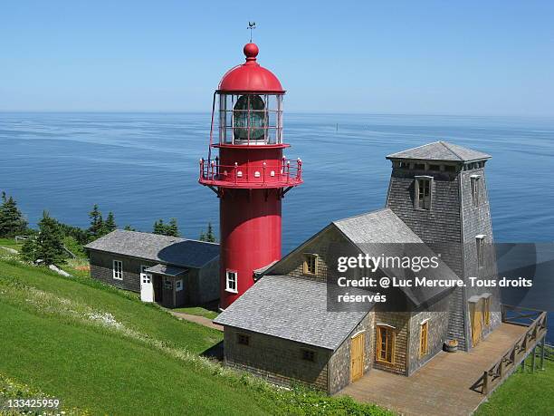 lighthouse in pointe a la renommee - gaspe peninsula stock pictures, royalty-free photos & images