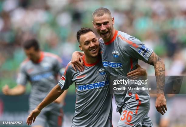 Felix Platte of SC Paderborn celebrates with team mates after scoring their side's second goal during the Second Bundesliga match between SV Werder...