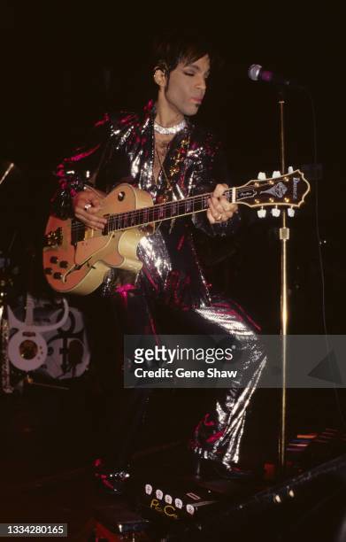 American R&B, Rock, and Pop musician Prince plays guitar as he performs onstage at Irving Plaza, New York, New York, April 11, 1998.