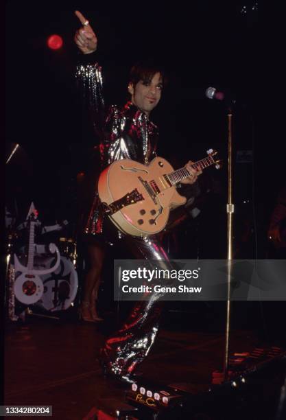 American R&B, Rock, and Pop musician Prince plays guitar as he performs onstage at Irving Plaza, New York, New York, April 11, 1998.