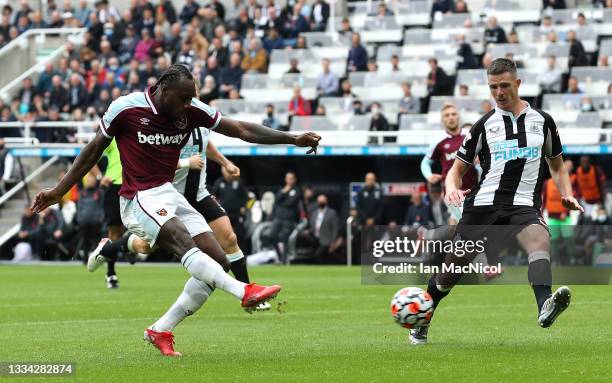 Michail Antonio of West Ham United scores their side's fourth goal during the Premier League match between Newcastle United and West Ham United at...