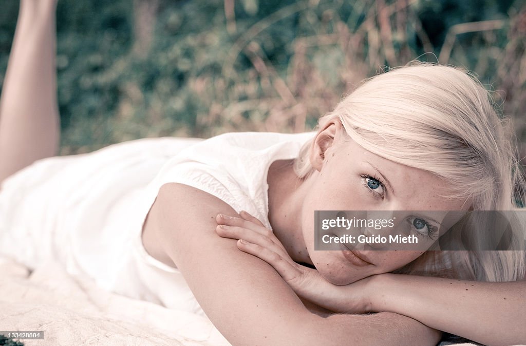 Girl lying on blanket
