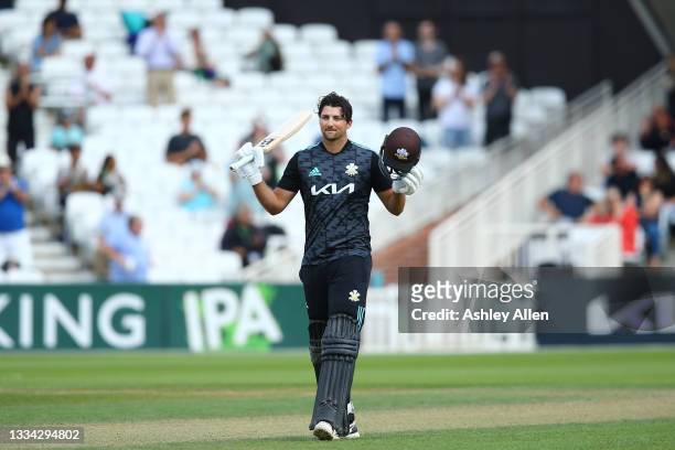 Tim David of Surrey reaches 100 during the Royal London Cup Quarter Final match between Surrey and Gloucestershire at the Kia Oval on August 15,...