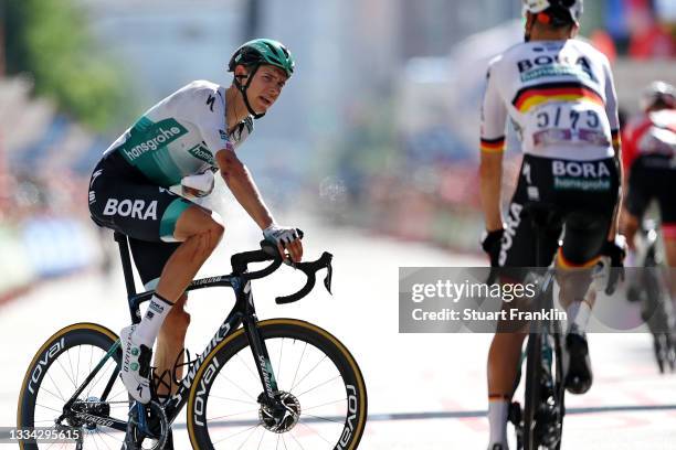 Patrick Gamper of Austria and Team Bora - Hansgrohe reacts after crosses the finishing line Injured due to a crash during the 76th Tour of Spain...