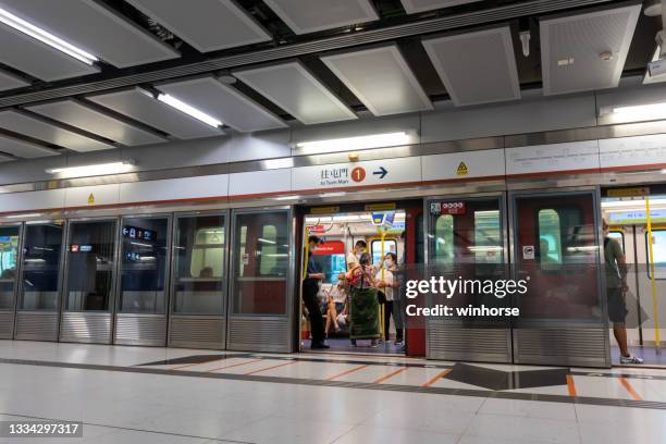 mtr tuen ma line austin station in kowloon, hong kong - tuen mun stock pictures, royalty-free photos & images