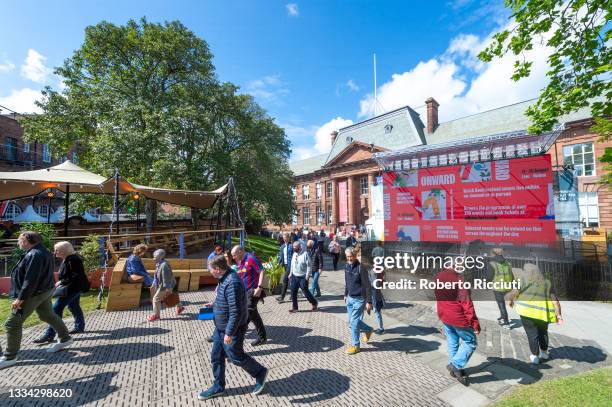 People walk around the new venue, the Edinburgh College of Art, during the Edinburgh International Book Festival 2021 on August 15, 2021 in...