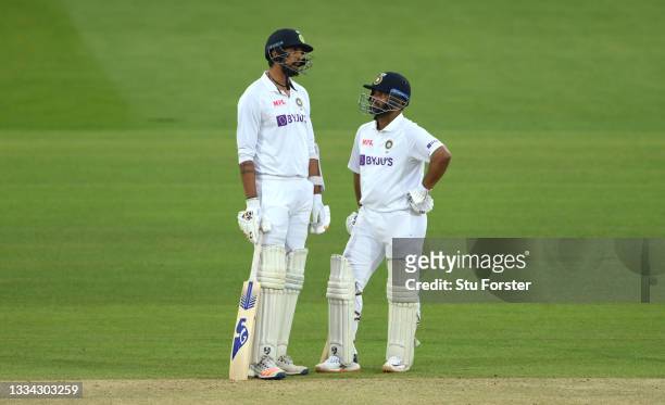 India batsmen Ishant Sharma and Rishabh Pant chat in the middle during day four of the Second Test Match between England and India at Lord's Cricket...
