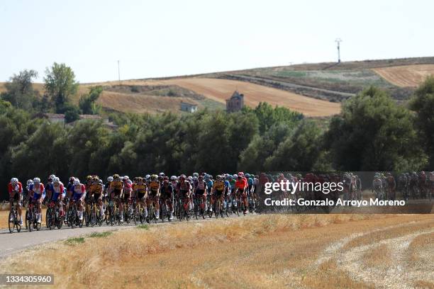 The peloton passing through a landscape during the 76th Tour of Spain 2021, Stage 2 a 166,7km stage from Caleruega - Monasterio de Santo Domingo de...