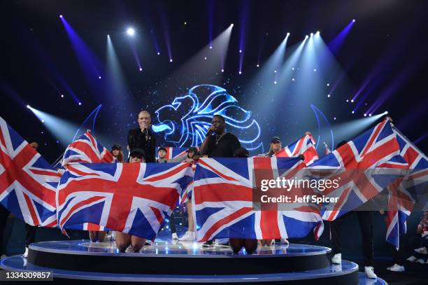 Poets and Mass Movement perform on stage during The National Lottery's Team GB homecoming event at the SSE Arena Wembley on August 15, 2021 in...