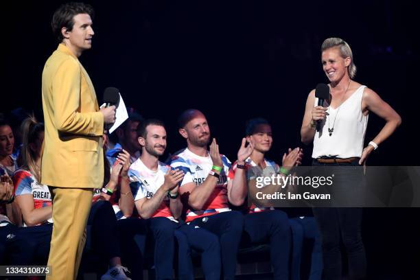 Presenter Greg James speaks with Alexandra Danson during The National Lottery's Team GB homecoming event at the SSE Arena Wembley on August 15, 2021...