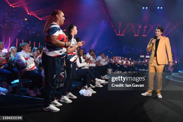 Emily Jade Campbell speaks with Greg James on stage during The National Lottery's Team GB homecoming event at the SSE Arena Wembley on August 15,...