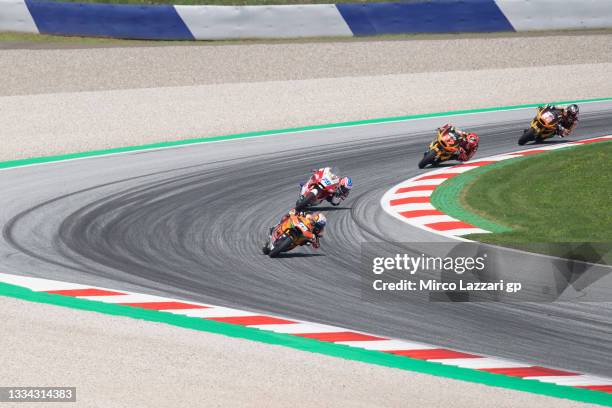 Raul Fernandez of Spain and Red Bull KTM Ajo leads the field during the Moto2 race during the MotoGP of Austria - Race at Red Bull Ring on August 15,...