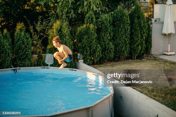 home swimming pool - above ground pool stock pictures, royalty-free photos & images