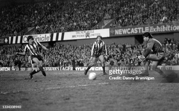 Newcastle striker Peter Beardsley slots home his hat trick goal past Sunderland goalkeeper Chris Turner as Iain Baird looks on during the Division...