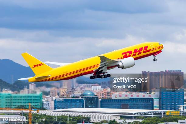 Freighter aircraft takes off from Shenzhen Baoan International Airport on August 15, 2021 in Shenzhen, Guangdong Province of China. The DHL B777...