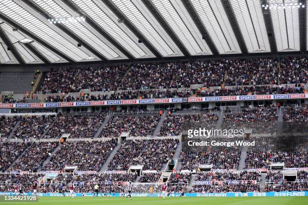 General view inside the stadium as fans watch on during the Premier League match between Newcastle United and West Ham United at St. James Park on...