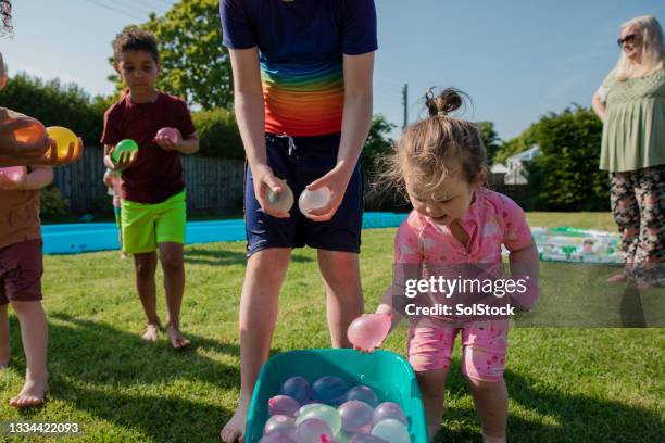 290 Water Balloon Fight Stock Photos, High-Res Pictures, and Images ...