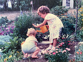 Big Sister Warning Little Brother 1988 in Garden