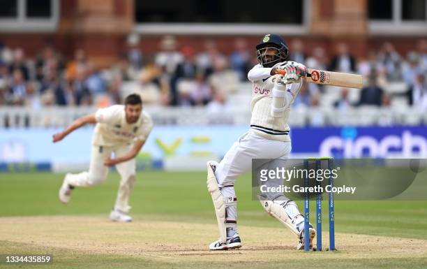 Jasprit Bumrah of India hits out at a shot ball from Mark Wood of England during day five of the Second LV= Insurance Test Match between England and...