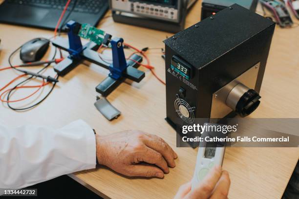 Calibrator Engineer Calibration Lab With People Photos and Premium High Res Pictures ...
