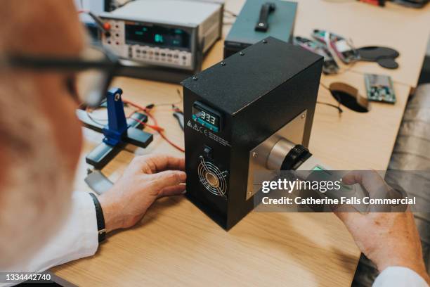 Calibrator Engineer Calibration Lab With People Photos and Premium High Res Pictures ...