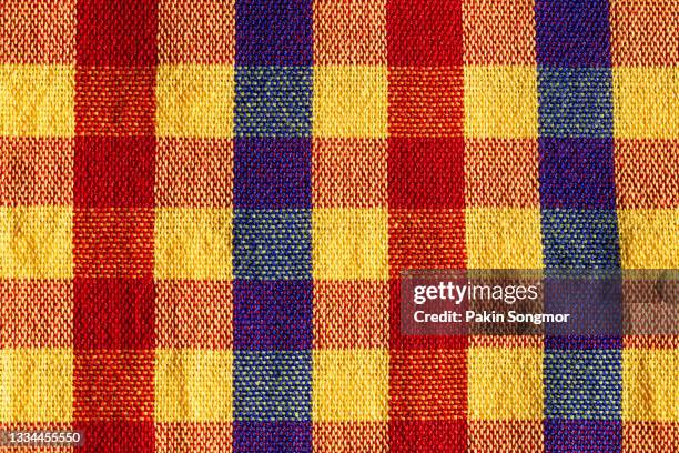 close-up plaid fabric pattern and texture and textile background - タータンチェック ストックフォトと画像