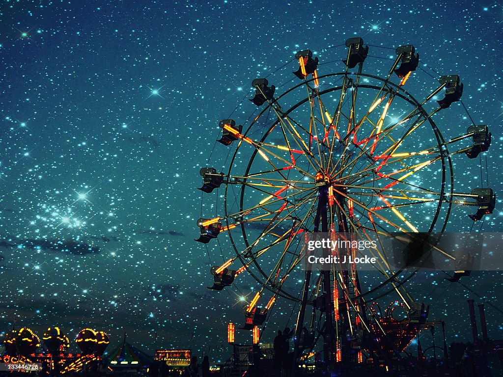 Fair Rides Wheel Ferris Wheel And Carnival Rides At Night High-Res Stock Photo - Getty ...