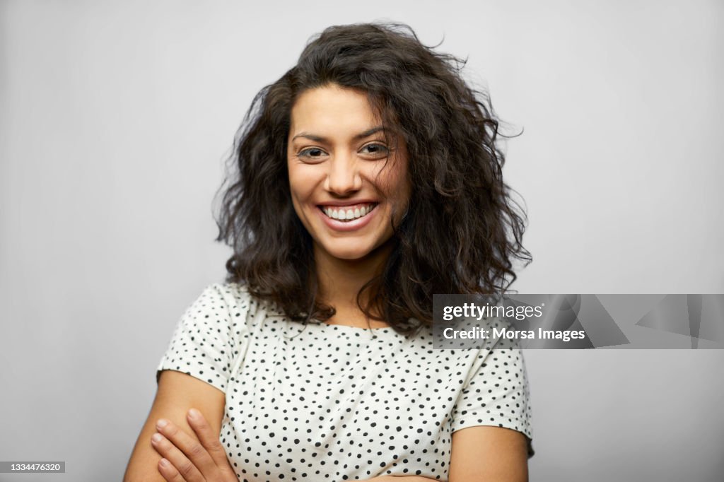 Beautiful Hispanic Woman Against White Background