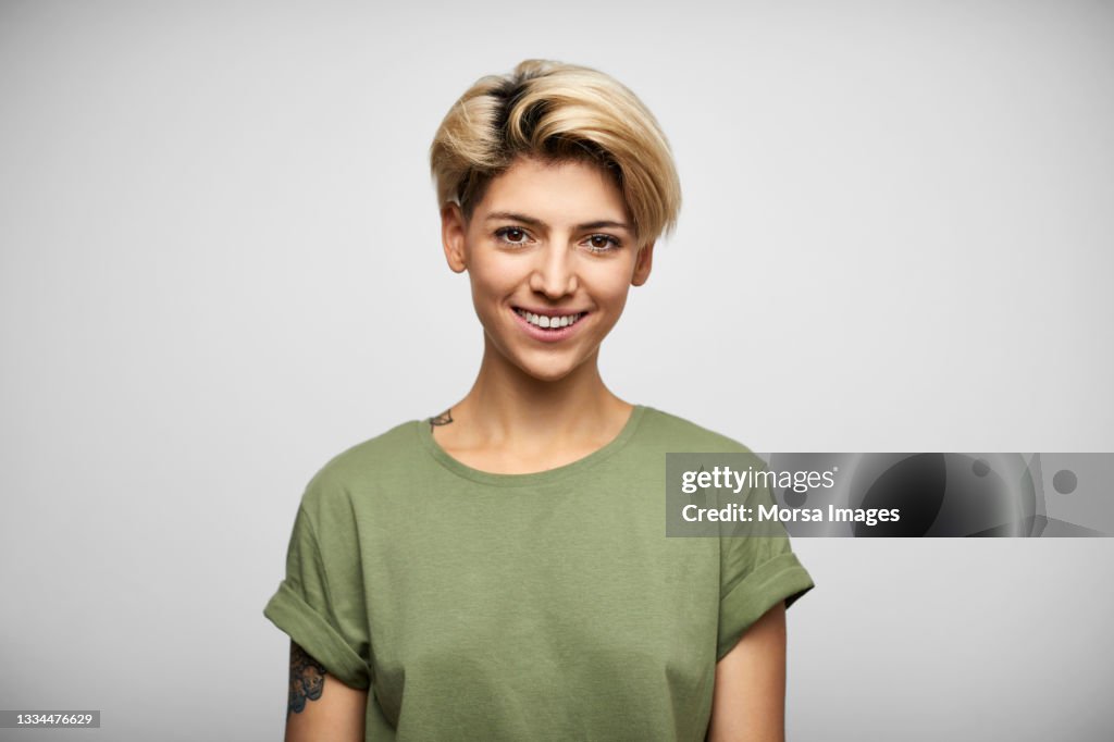 Happy Hispanic Female With Blond Short Hair