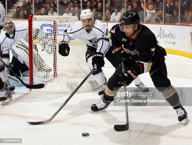Andrew Cogliano of the Anaheim Ducks handles the puck against Drew Doughty of the Los Angeles Kings during the game on November 17, 2011 at Honda...