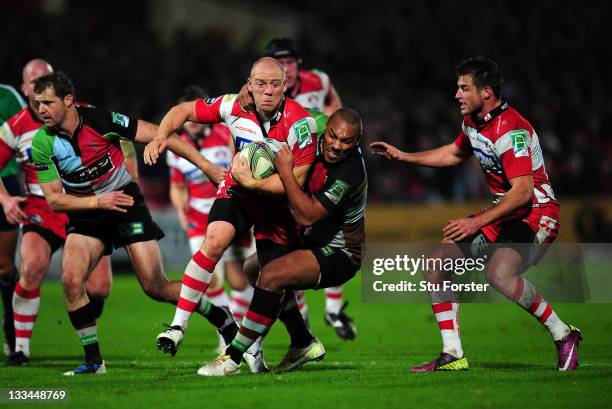 Gloucester centre Mike Tindall is stopped by Jordan Turner-Hall during the Heineken Cup match between Gloucester and Harlequins at Kingsholm Stadium...