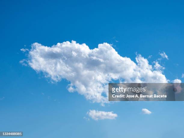 full frame of the low angle view of white color clouds  with a blue sky. - grey clouds stock pictures, royalty-free photos & images